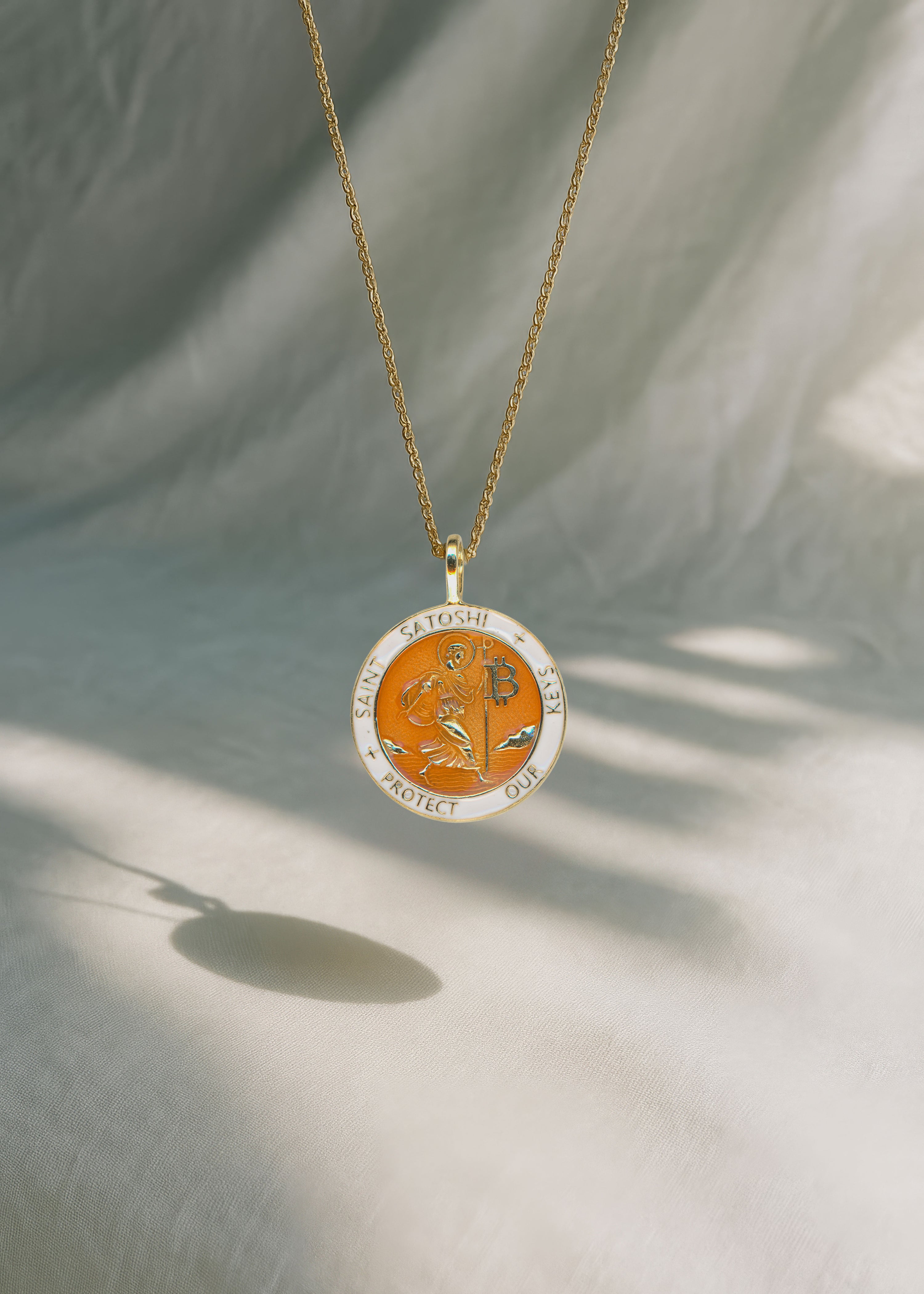 Saint Satoshi Pendant — Genesis Orange