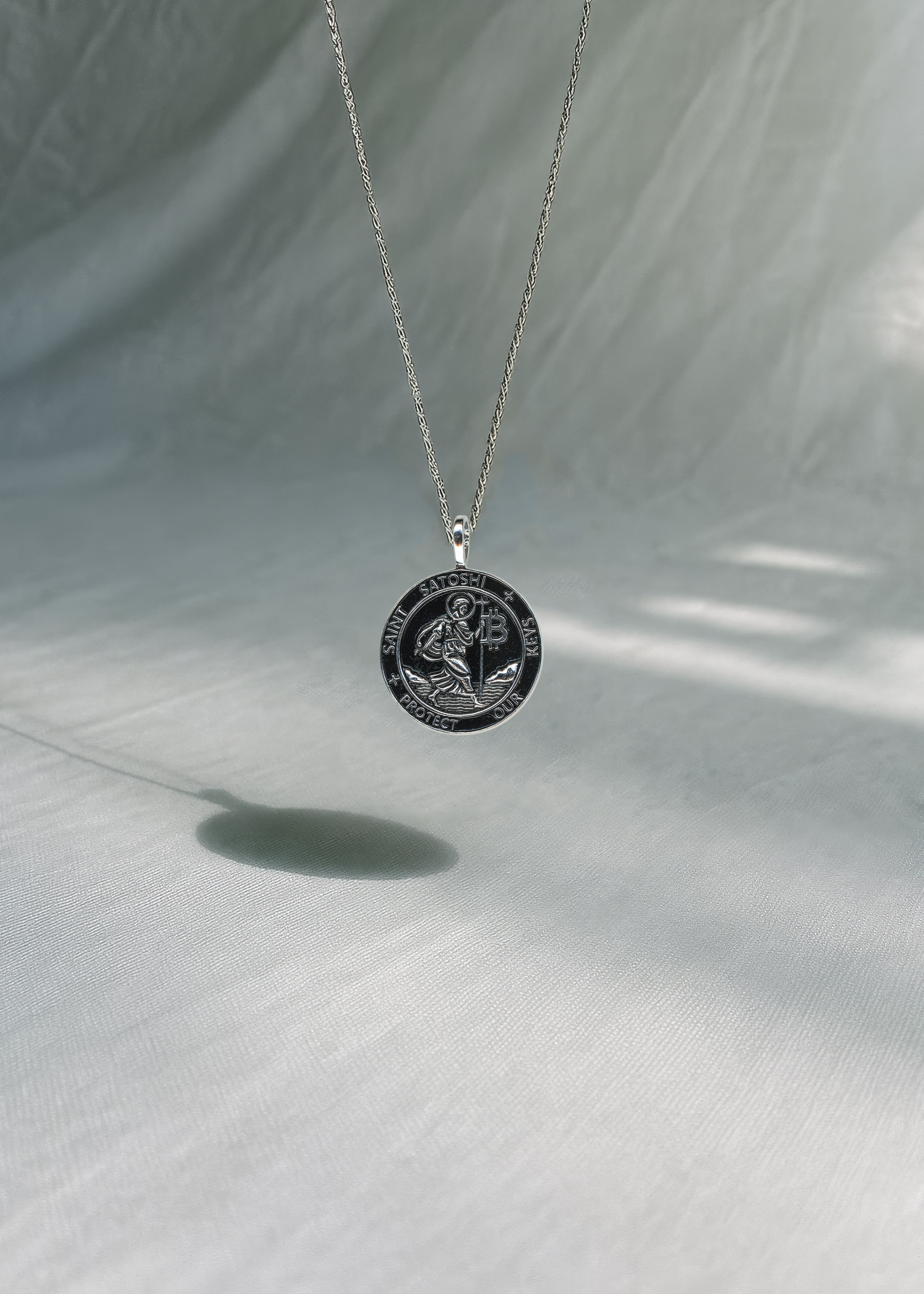 Saint Satoshi Pendant — Obsidian Edition
